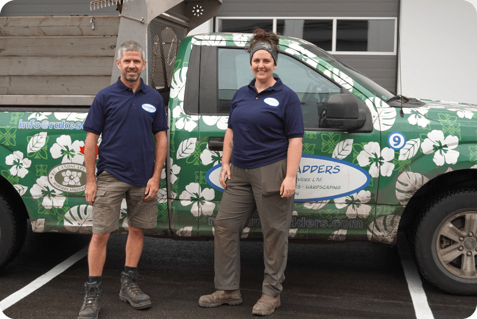Rakes & Ladders team in front of a company truck
